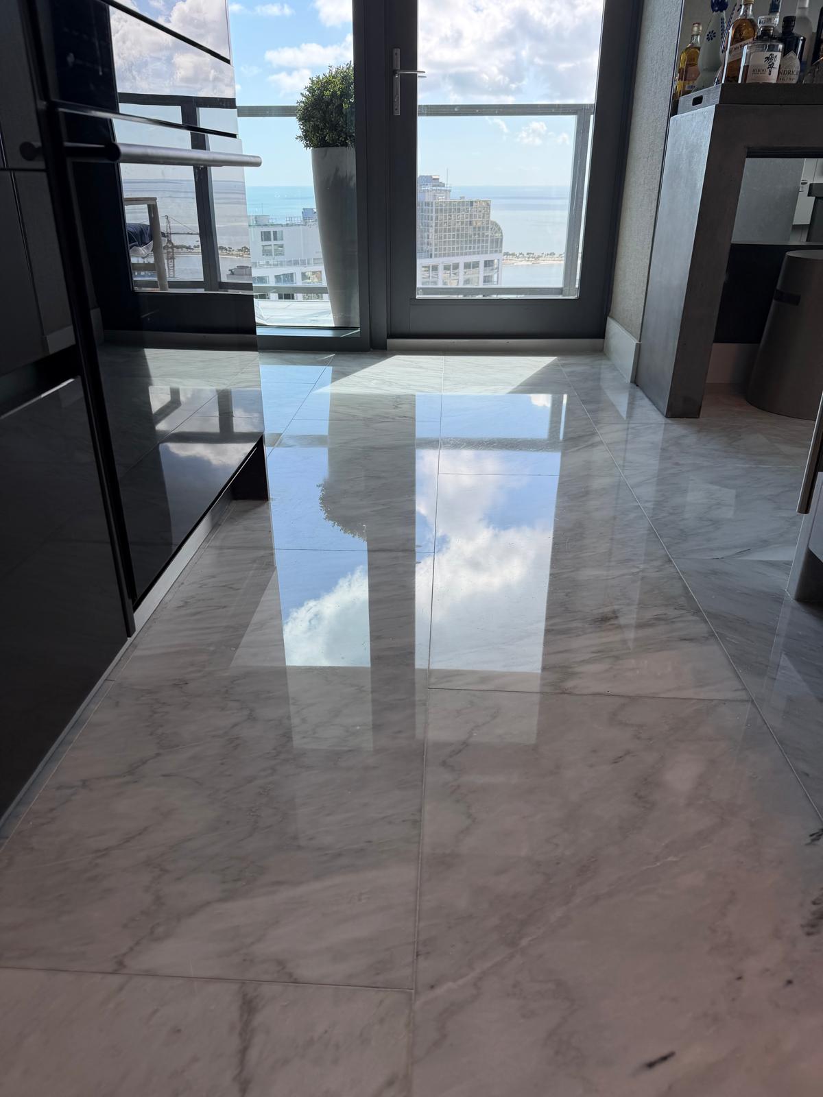 Close-up of granite countertop polishing and sealing in Florida